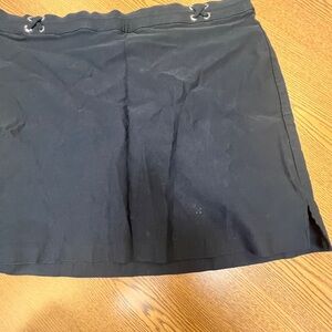 Black skirt with attached shorts.